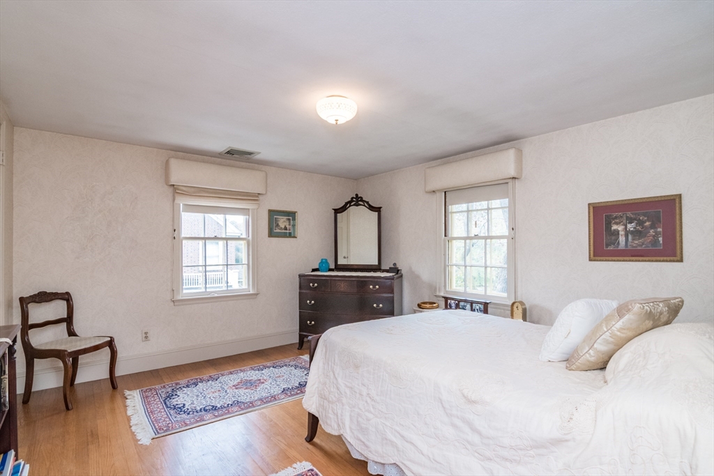32 Longview Drive Longmeadow, MA 01106 - Photo 30 of 42 a bedroom with a bed and a window