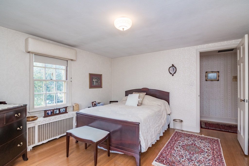 32 Longview Drive Longmeadow, MA 01106 - Photo 31 of 42 a bed room with a bed and a desk