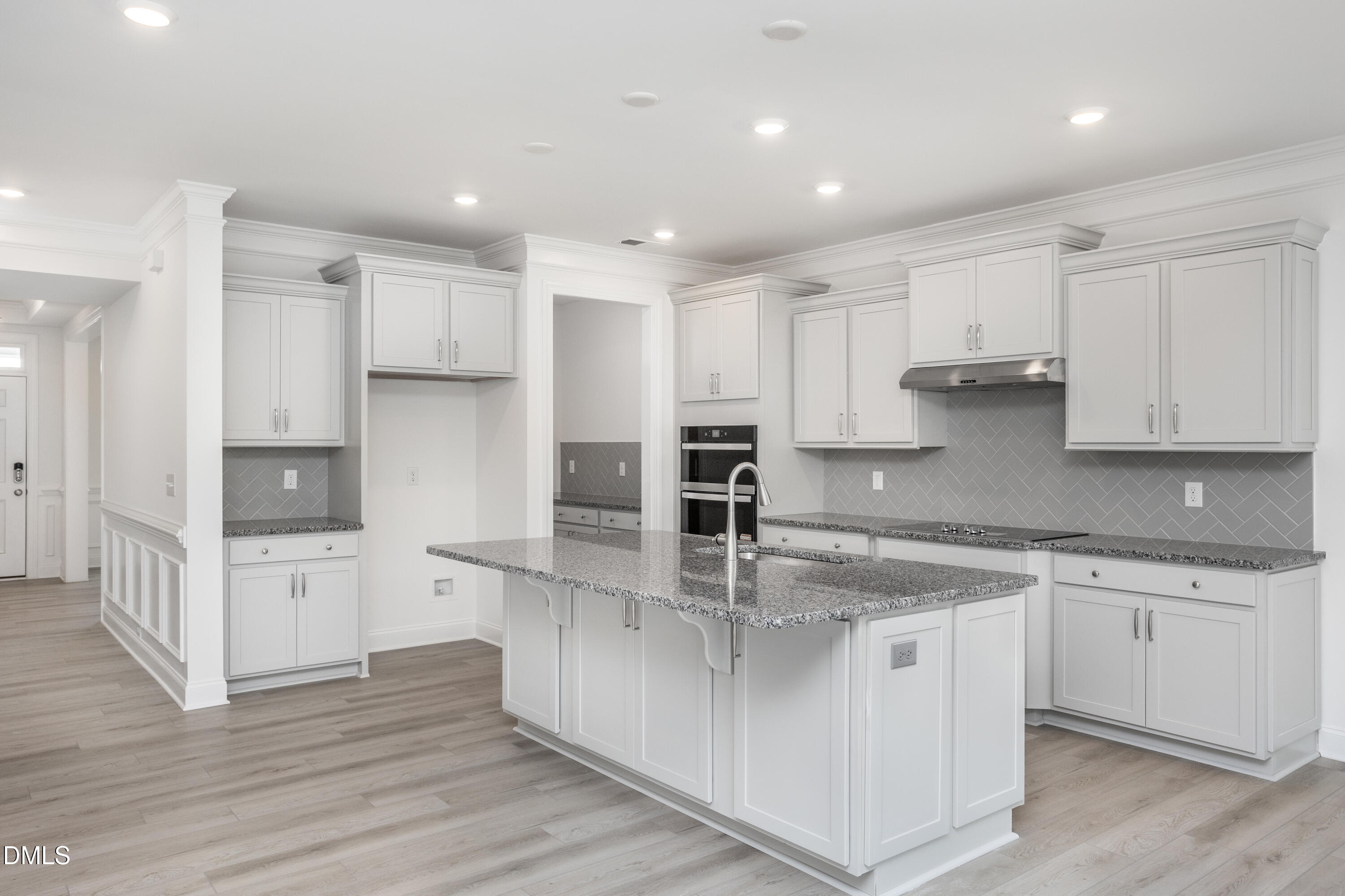 216 Cedar Rdg Trail Angier, NC 27501 - Photo 10 of 33 a large kitchen with stainless steel appliances granite countertop a stove a sink and a refrigerator