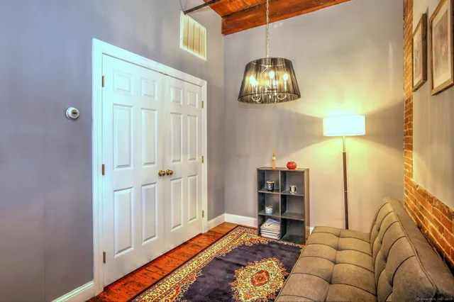 a kitchen with refrigerator a stove and a sink