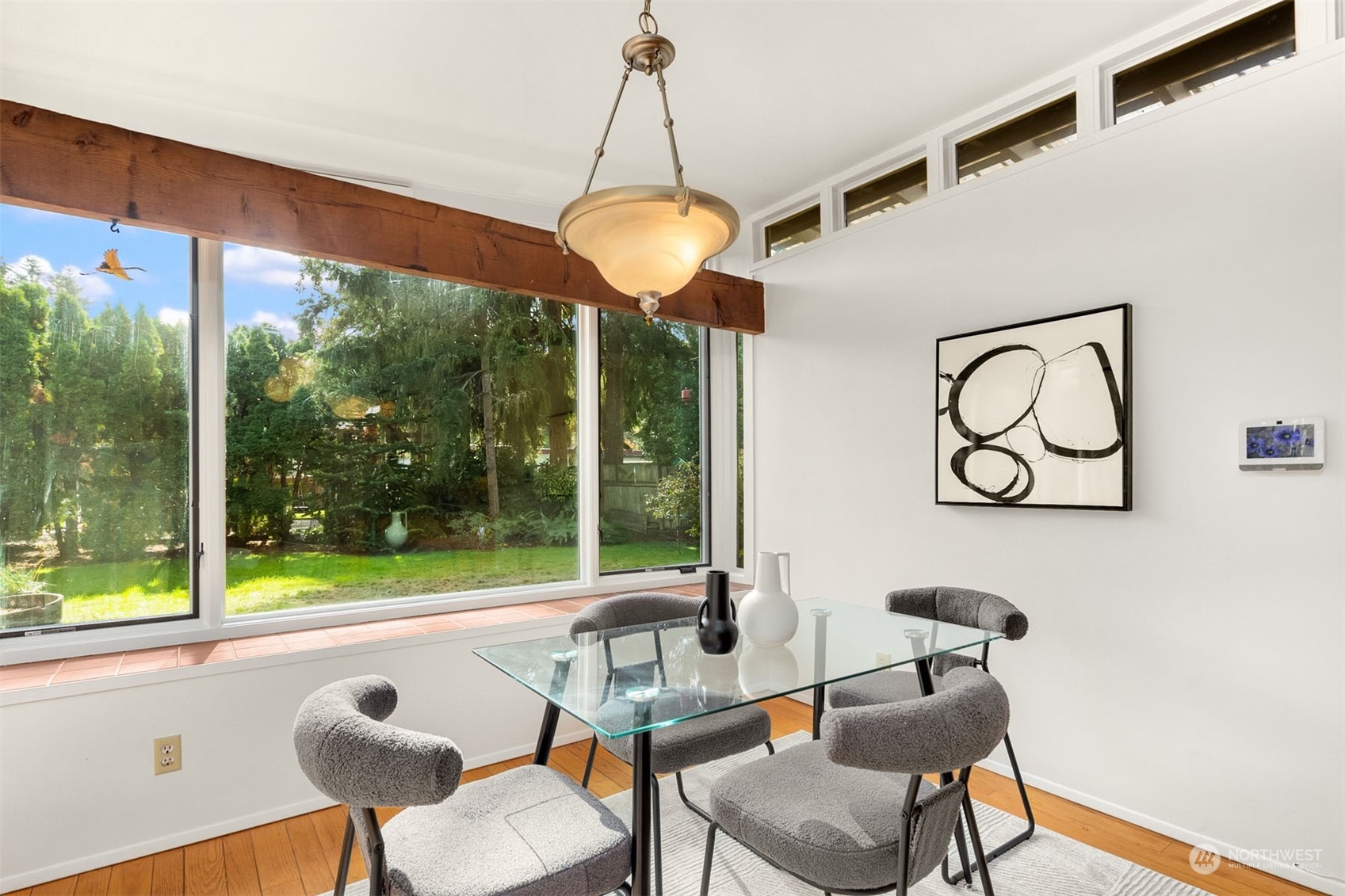 15040 131st Avenue Southeast Renton, WA 98058 - Photo 14 of 39 a dining room with furniture and a large window