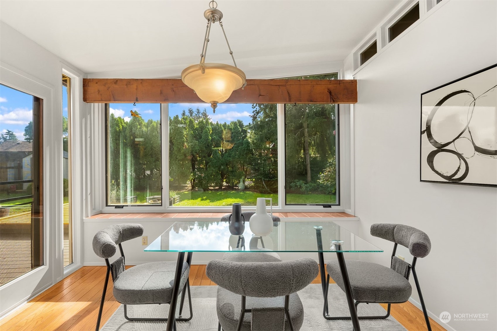 15040 131st Avenue Southeast Renton, WA 98058 - Photo 15 of 39 a view of a dining room with furniture window and outside view
