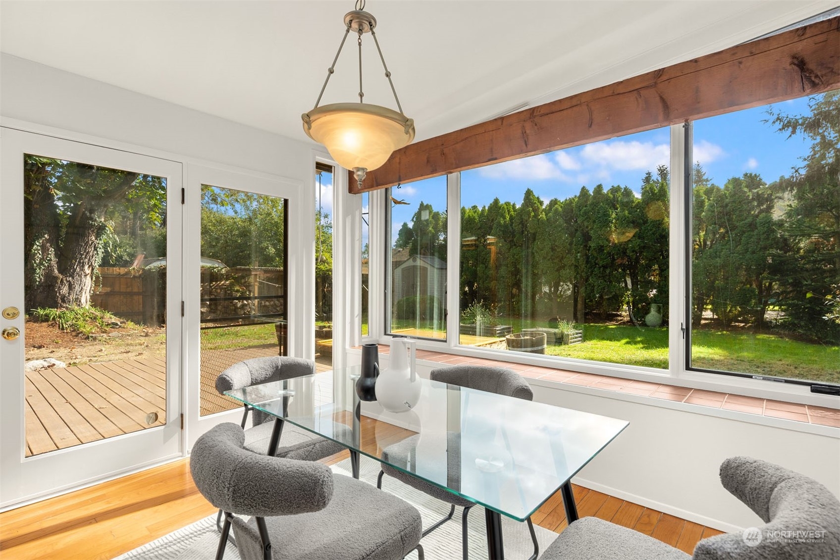 15040 131st Avenue Southeast Renton, WA 98058 - Photo 16 of 39 a view of a dining room with furniture water view and a bathtub