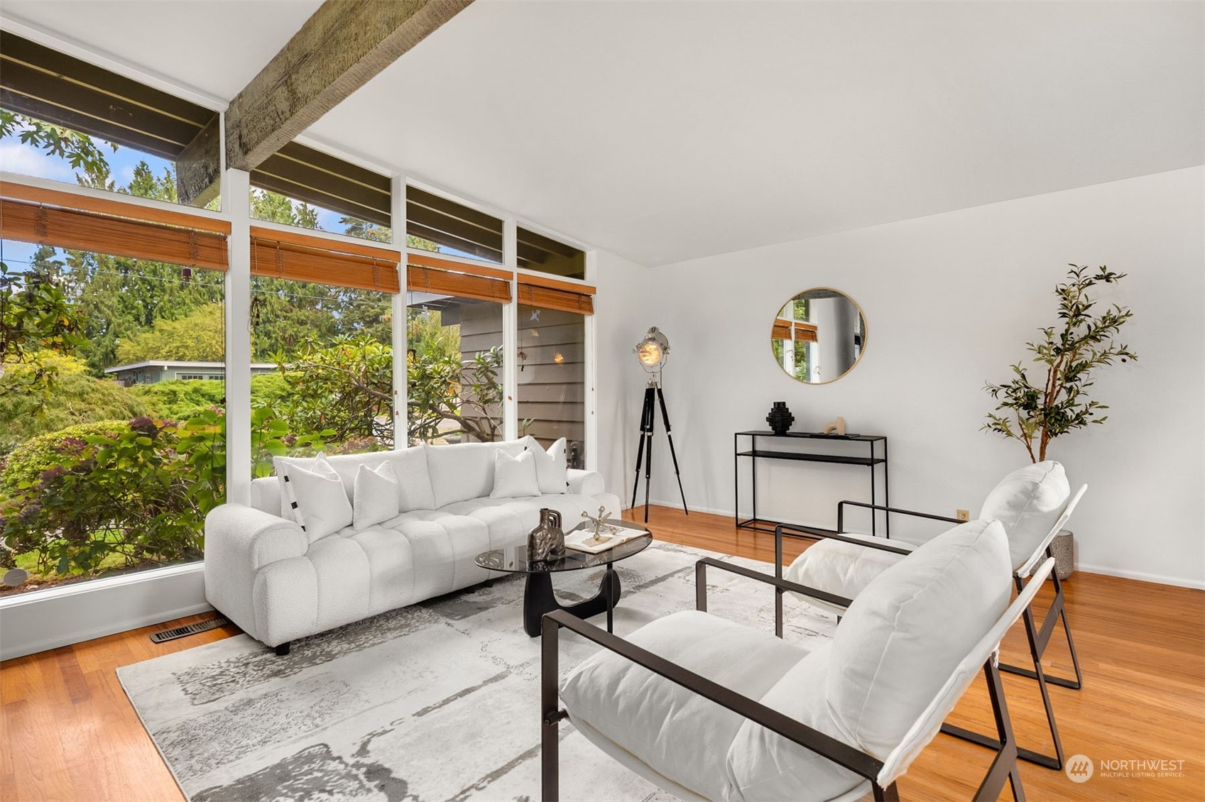 15040 131st Avenue Southeast Renton, WA 98058 - Photo 2 of 39 a living room with furniture and a window