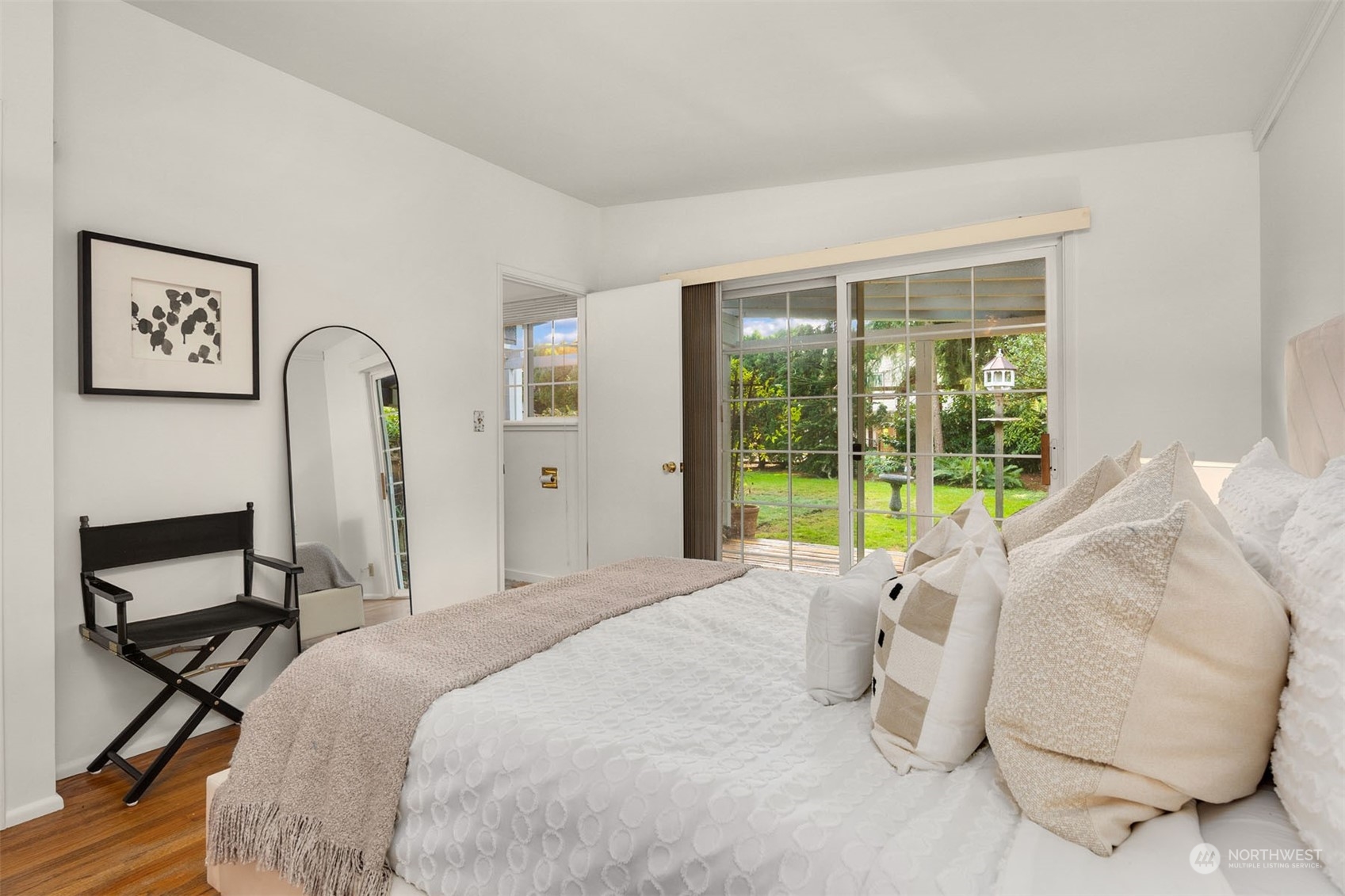 15040 131st Avenue Southeast Renton, WA 98058 - Photo 22 of 39 a bedroom with a bed and a large window
