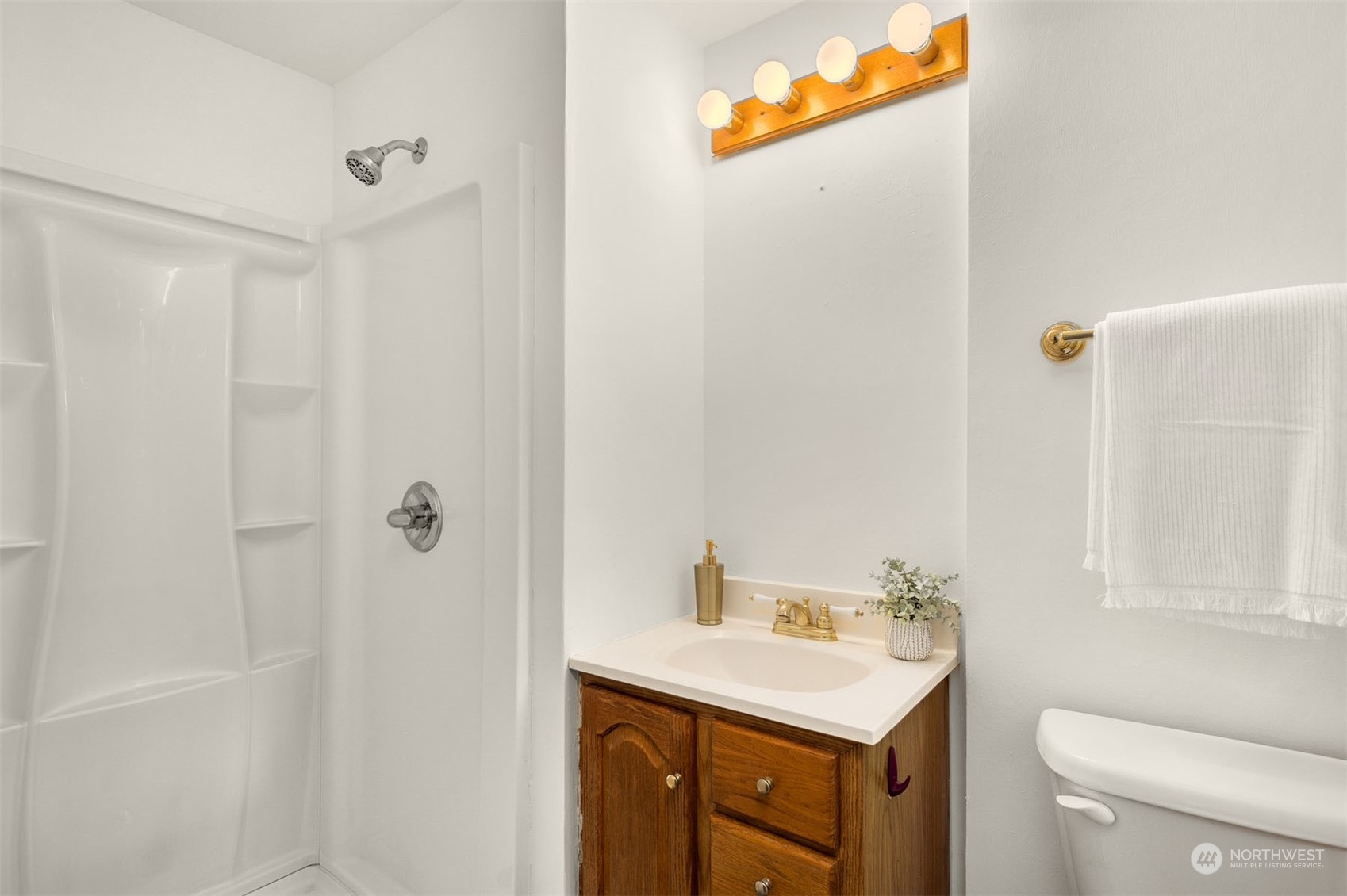 15040 131st Avenue Southeast Renton, WA 98058 - Photo 23 of 39 a bathroom with a sink a toilet and shower