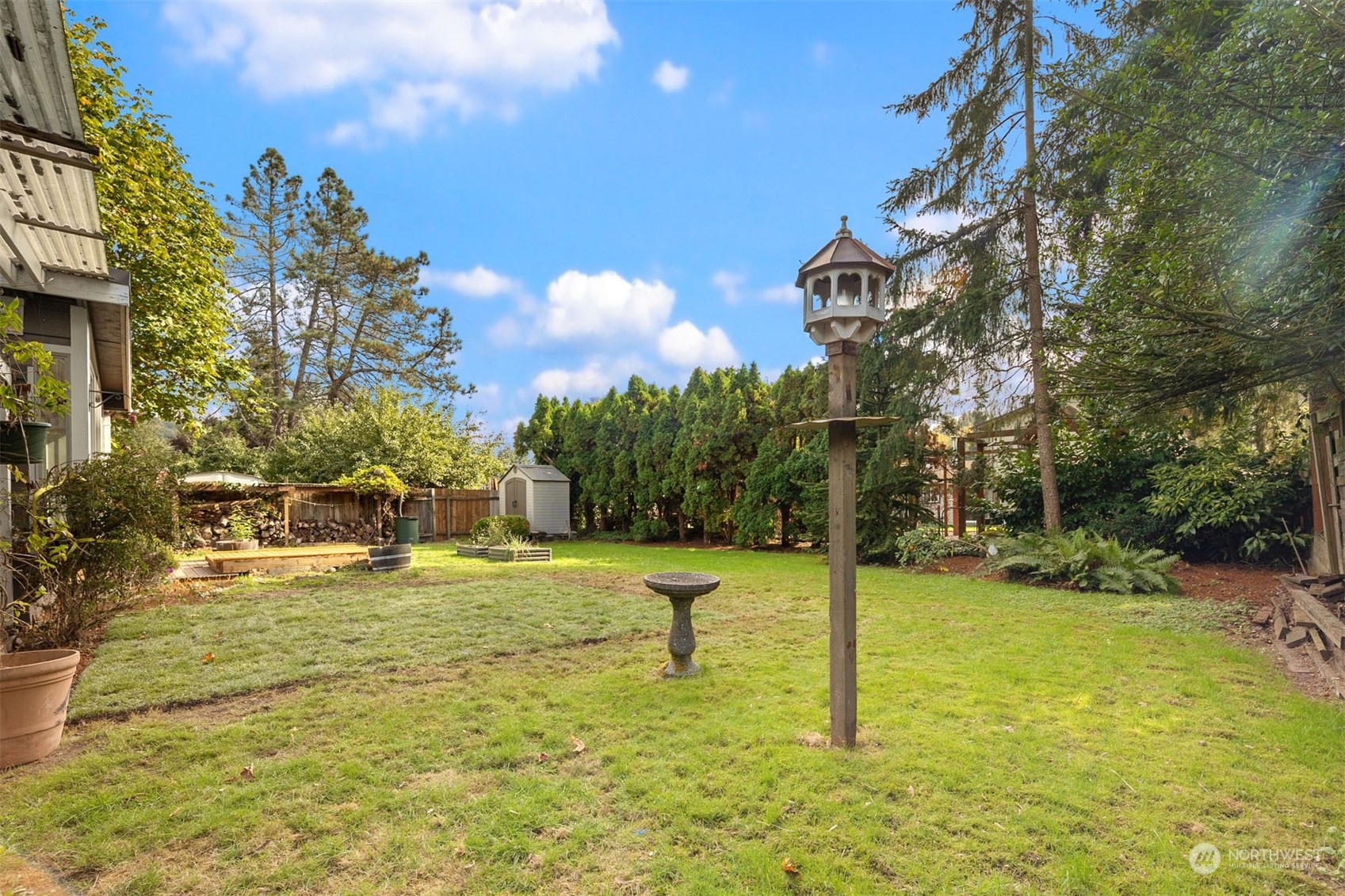 15040 131st Avenue Southeast Renton, WA 98058 - Photo 29 of 39 a backyard of a house with lots of green space