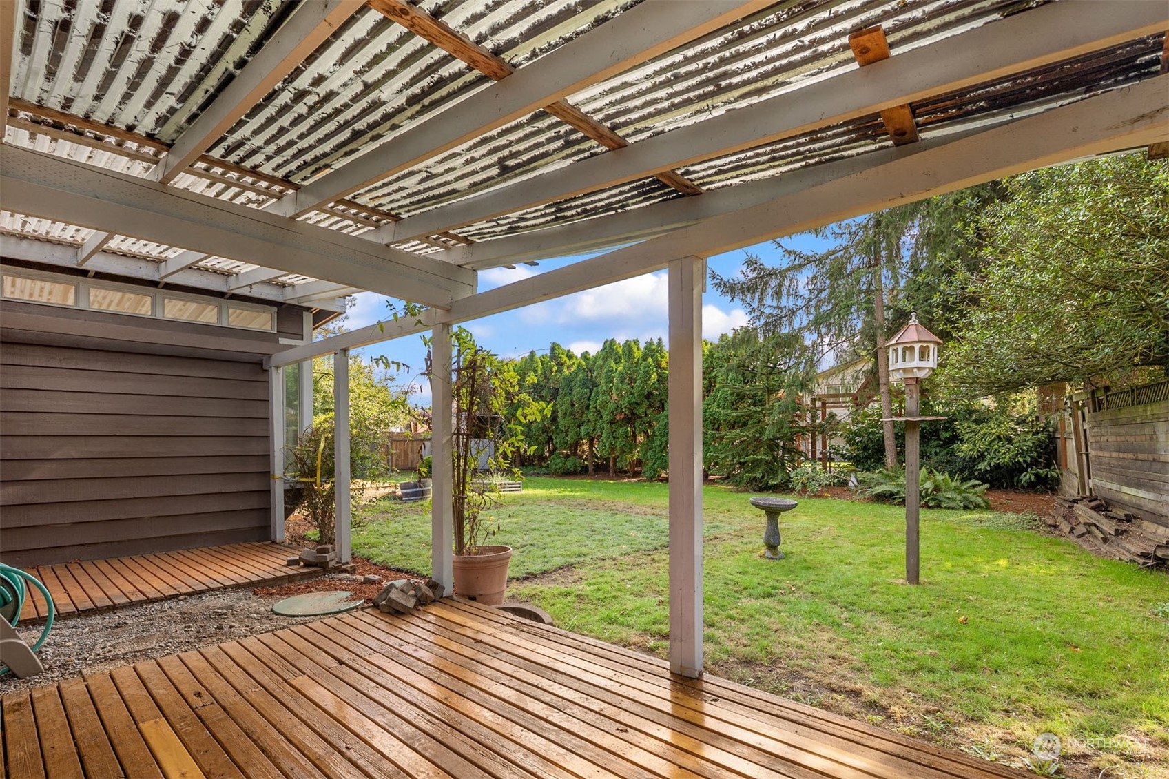 15040 131st Avenue Southeast Renton, WA 98058 - Photo 31 of 39 a view of a porch with a backyard