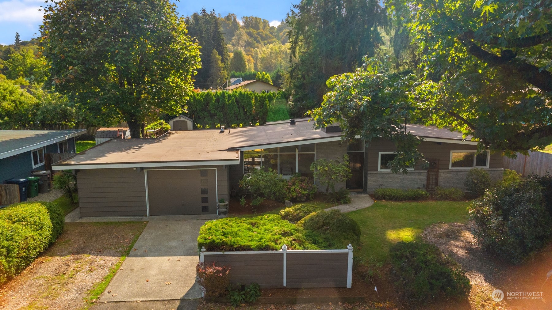 15040 131st Avenue Southeast Renton, WA 98058 - Photo 32 of 39 a front view of a house with garden