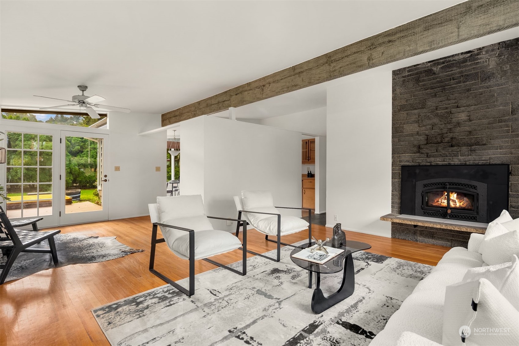 15040 131st Avenue Southeast Renton, WA 98058 - Photo 4 of 39 a living room with furniture and a fireplace