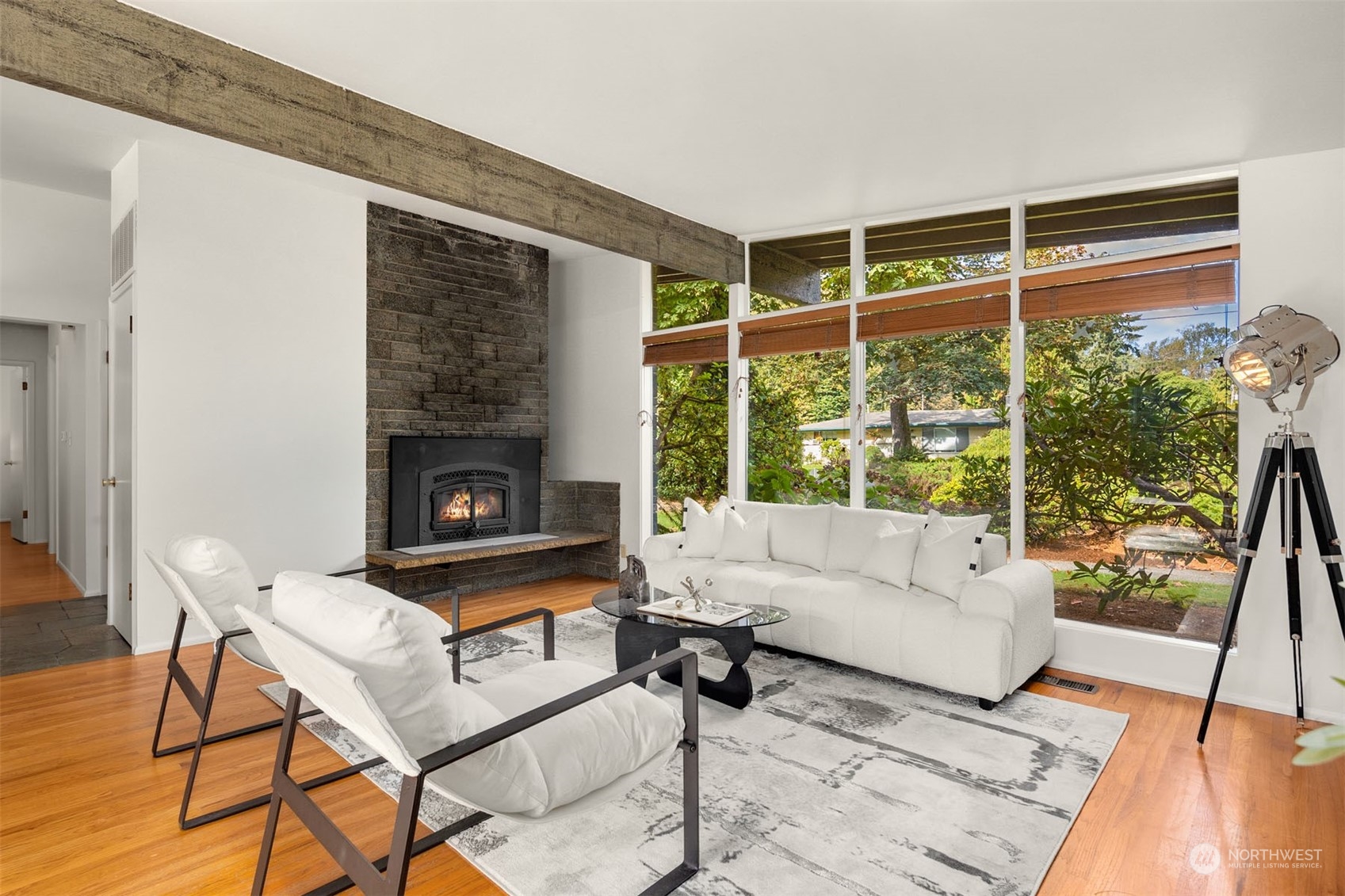15040 131st Avenue Southeast Renton, WA 98058 - Photo 5 of 39 a living room with furniture and a fireplace
