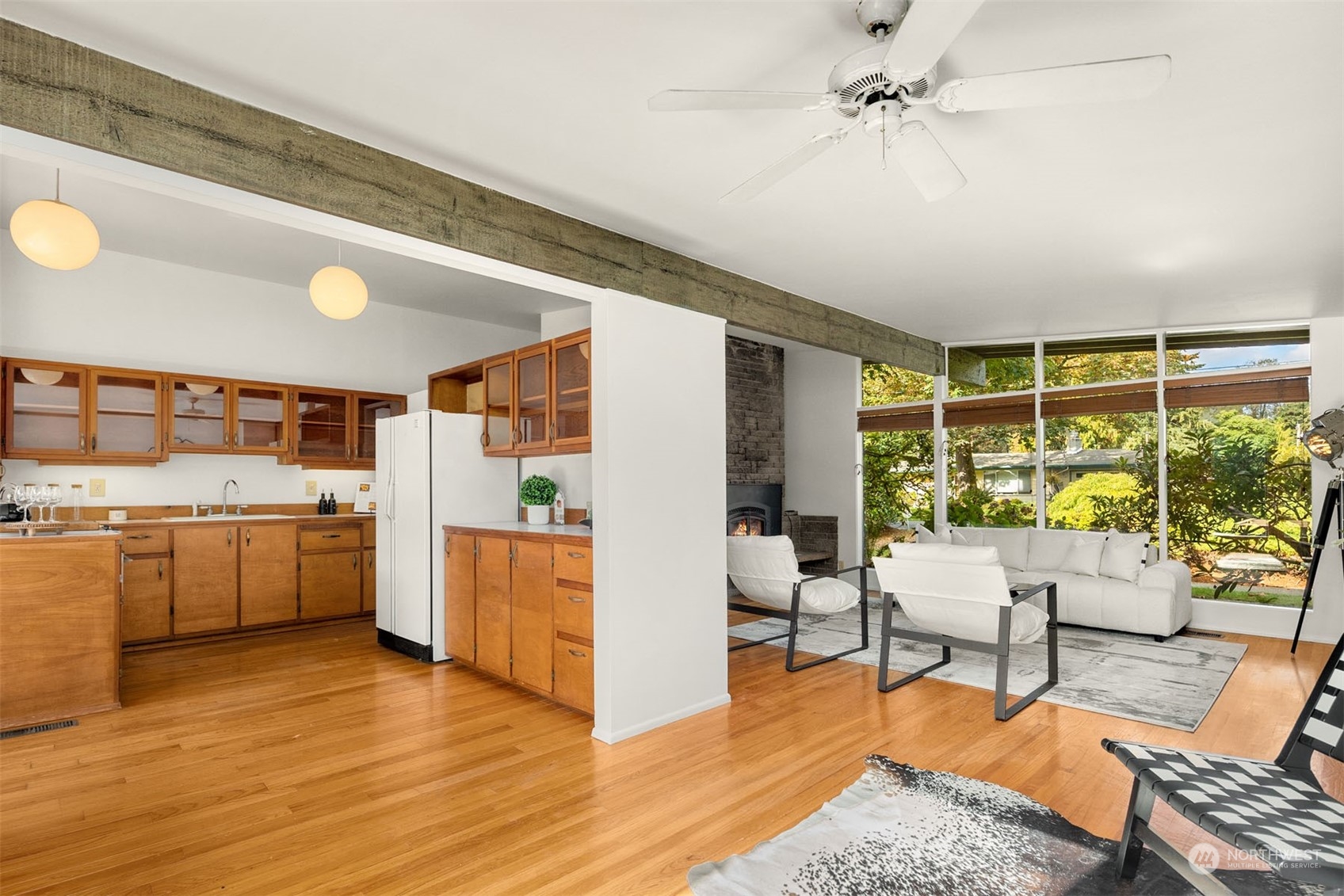 15040 131st Avenue Southeast Renton, WA 98058 - Photo 7 of 39 a living room with furniture and a large window