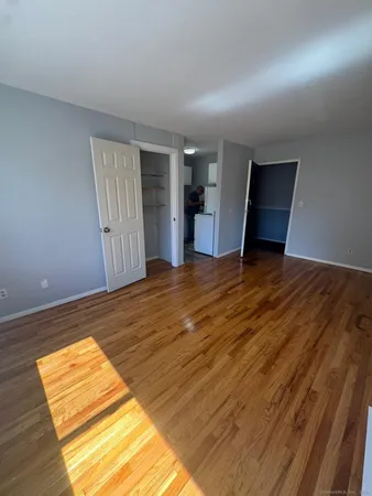 a view of an empty room and window