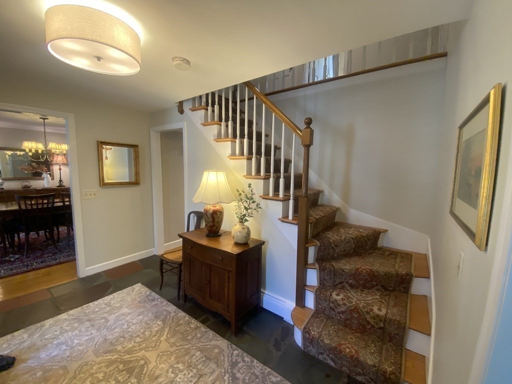 126 Maynard Farm Road Sudbury, MA 01776 - Photo 13 of 32 a living room with furniture and a fireplace