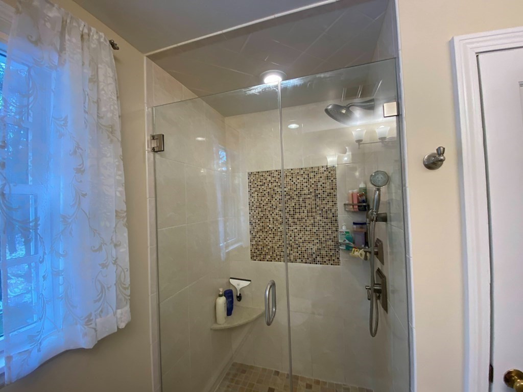 126 Maynard Farm Road Sudbury, MA 01776 - Photo 16 of 32 a bathroom with a shower and a sink