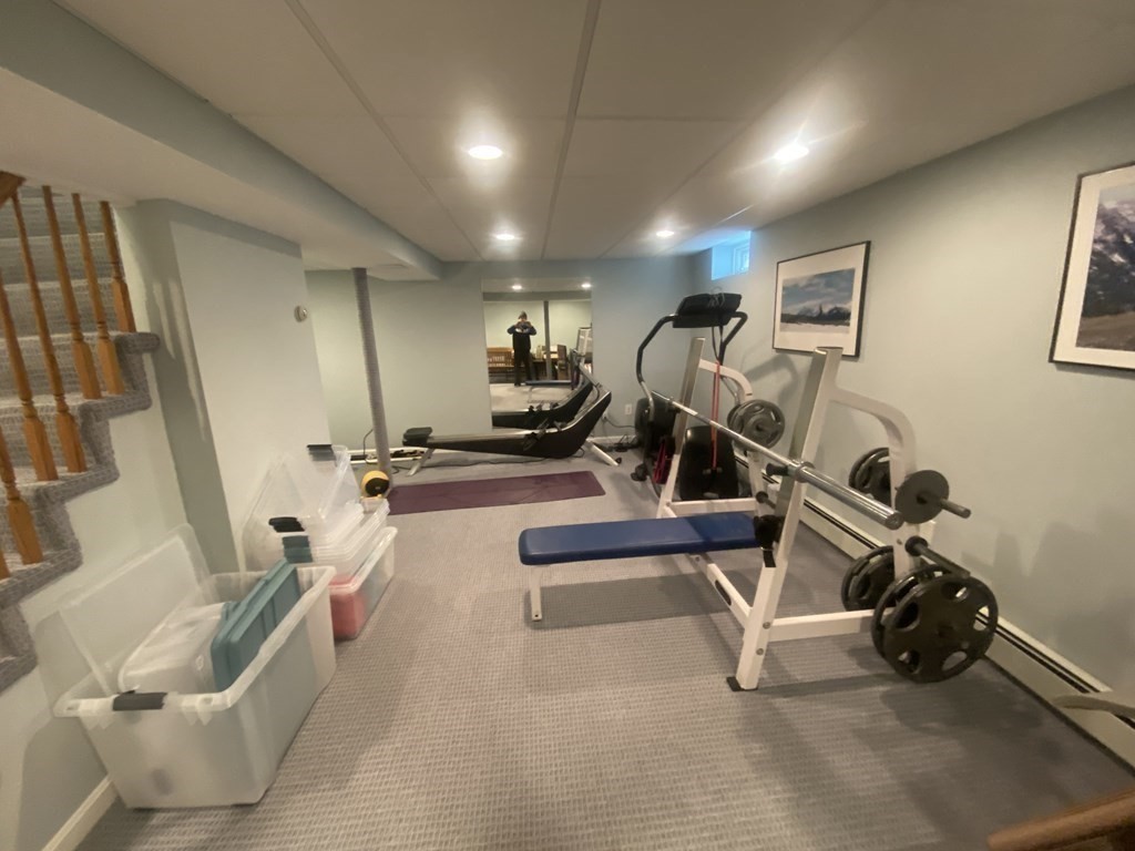 126 Maynard Farm Road Sudbury, MA 01776 - Photo 26 of 32 a view of a room with gym equipment
