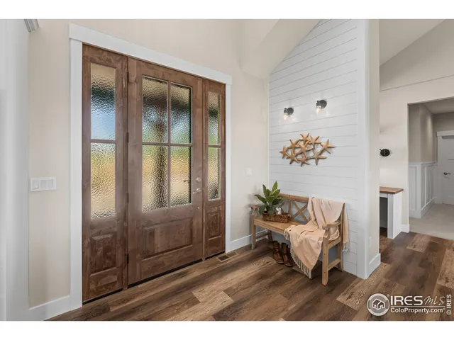 a kitchen with stainless steel appliances kitchen island granite countertop a stove a sink and a microwave