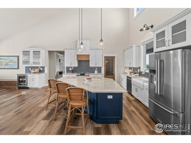 a view of living room with furniture and window