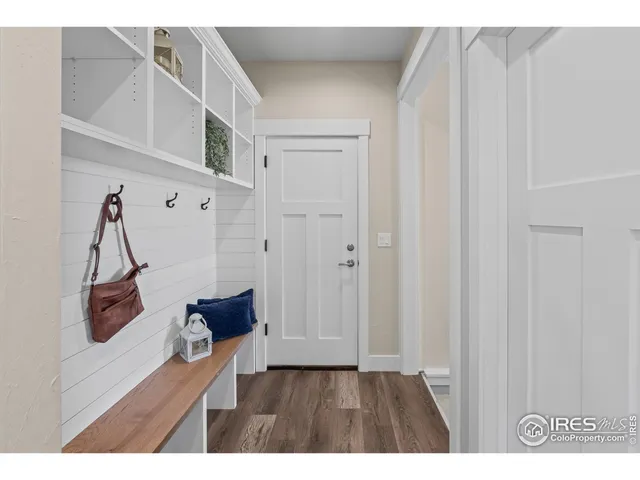 a kitchen with a stove a sink and a refrigerator