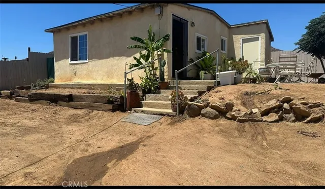 a view of a bedroom with a bed