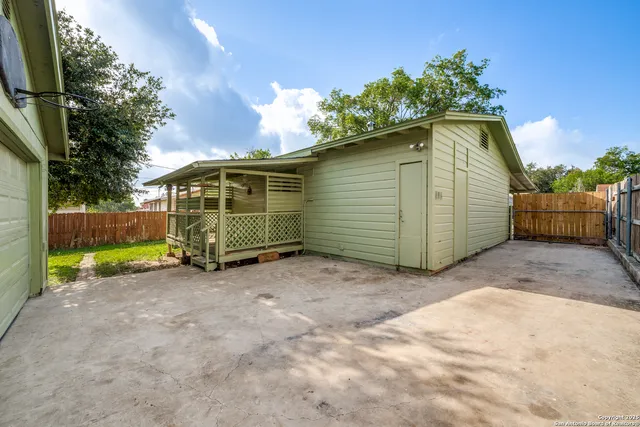 a backyard of a house with lots of green space