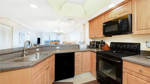 a spacious bathroom with a shower sink and mirror