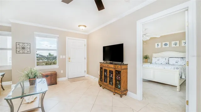 a kitchen with stainless steel appliances kitchen island granite countertop a refrigerator and microwave