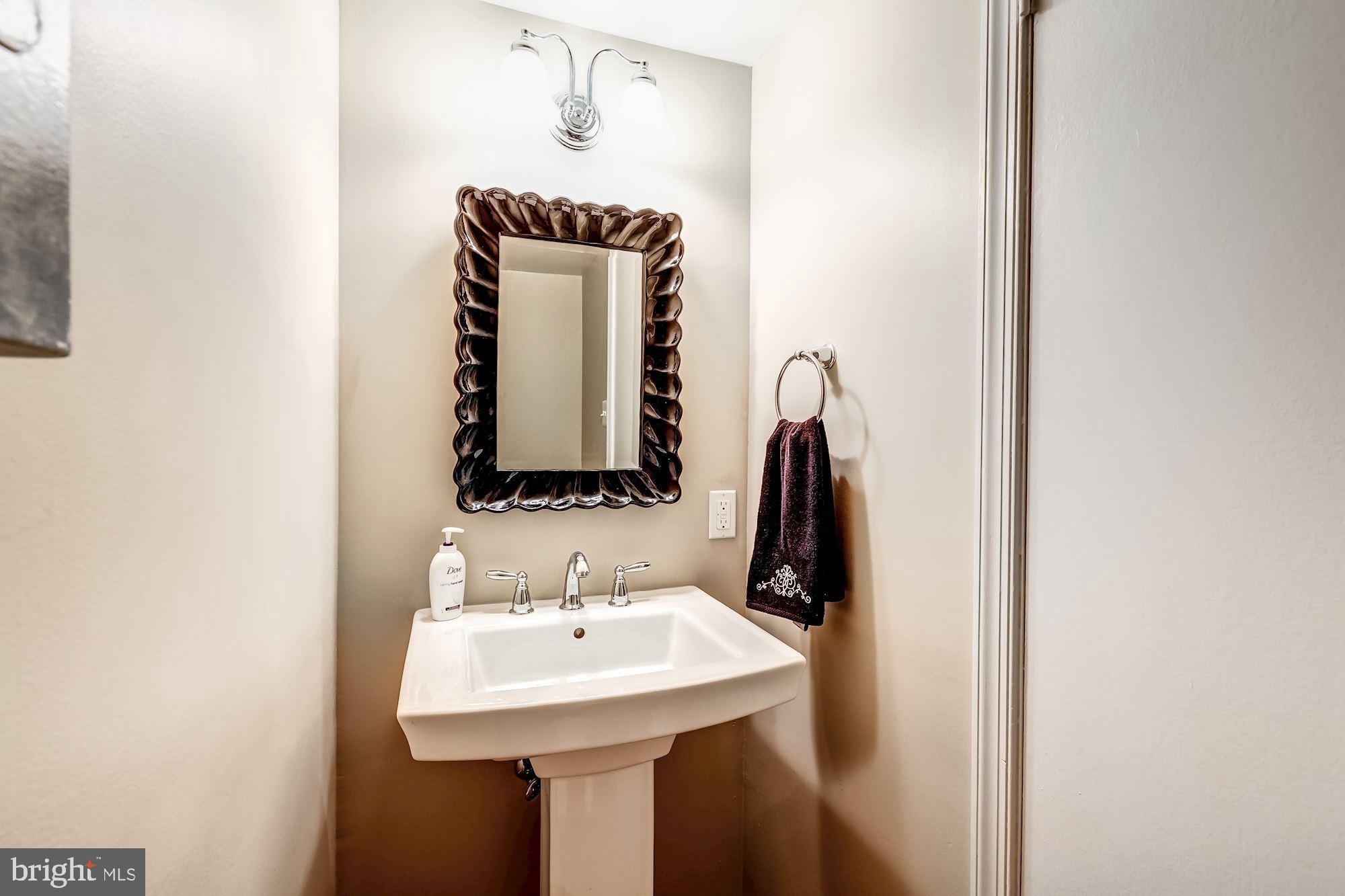 5429 Richenbacher Avenue Alexandria, VA 22304 - Photo 12 of 31 Main level half bath for guests