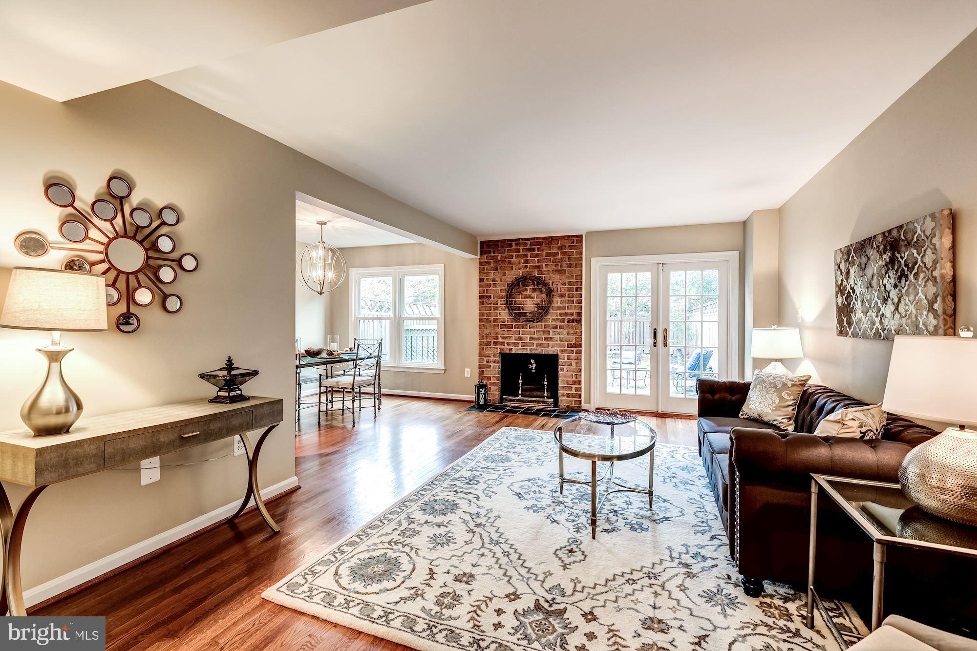5429 Richenbacher Avenue Alexandria, VA 22304 - Photo 5 of 31 Living Room with wood-burning fireplace