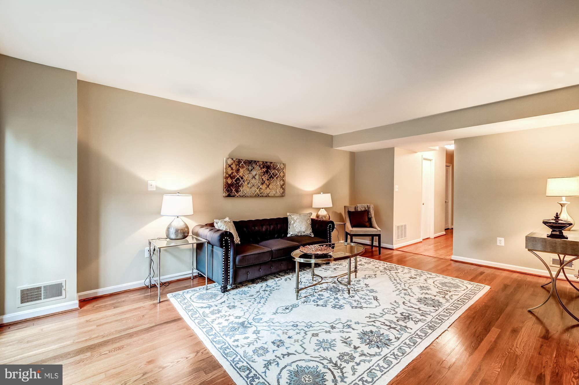 5429 Richenbacher Avenue Alexandria, VA 22304 - Photo 6 of 31 Living Room that walks out to the brick patio