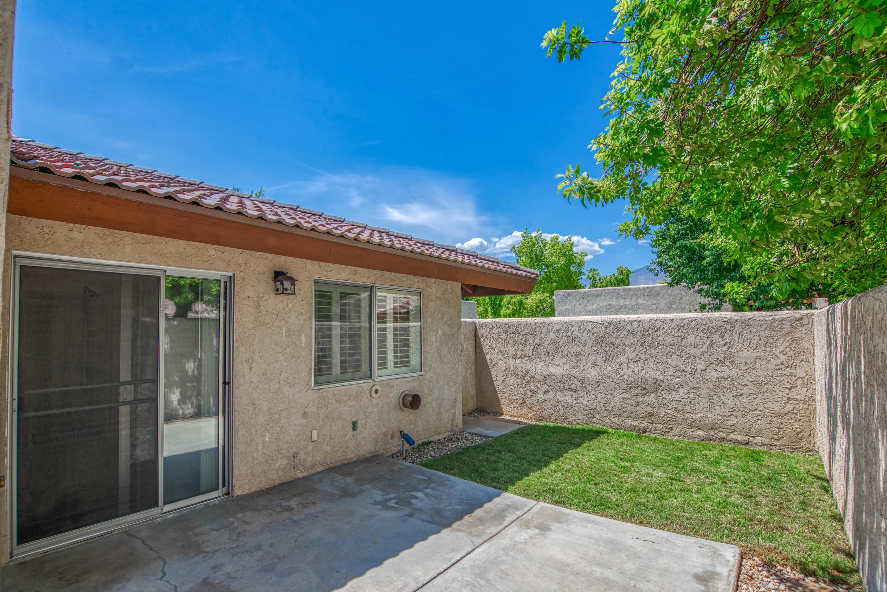 3518 Ridgeview Circle South Palm Springs, CA 92264 - Photo 13 of 32 front view of a house with a yard