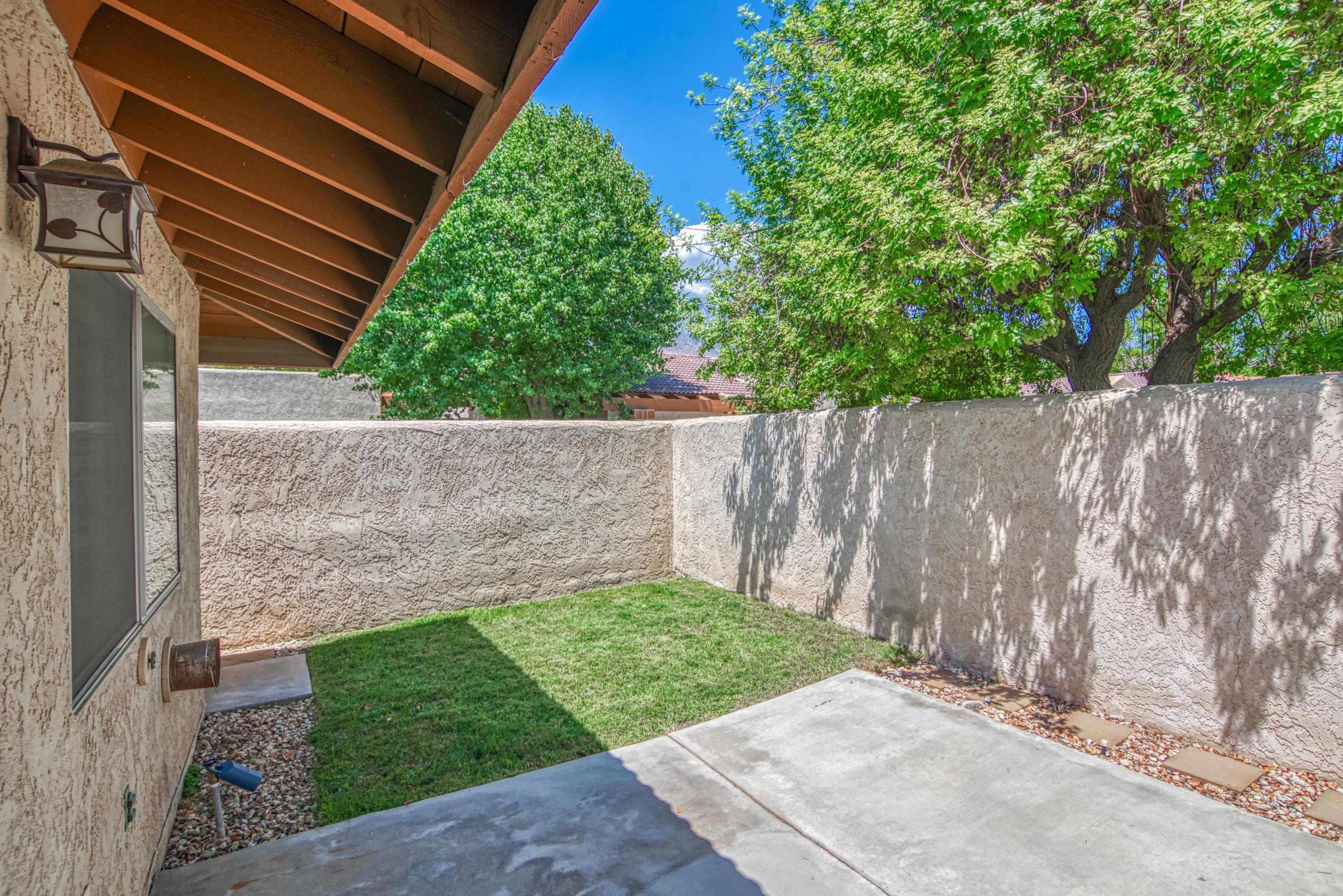 3518 Ridgeview Circle South Palm Springs, CA 92264 - Photo 14 of 32 a view of a backyard with wooden fence