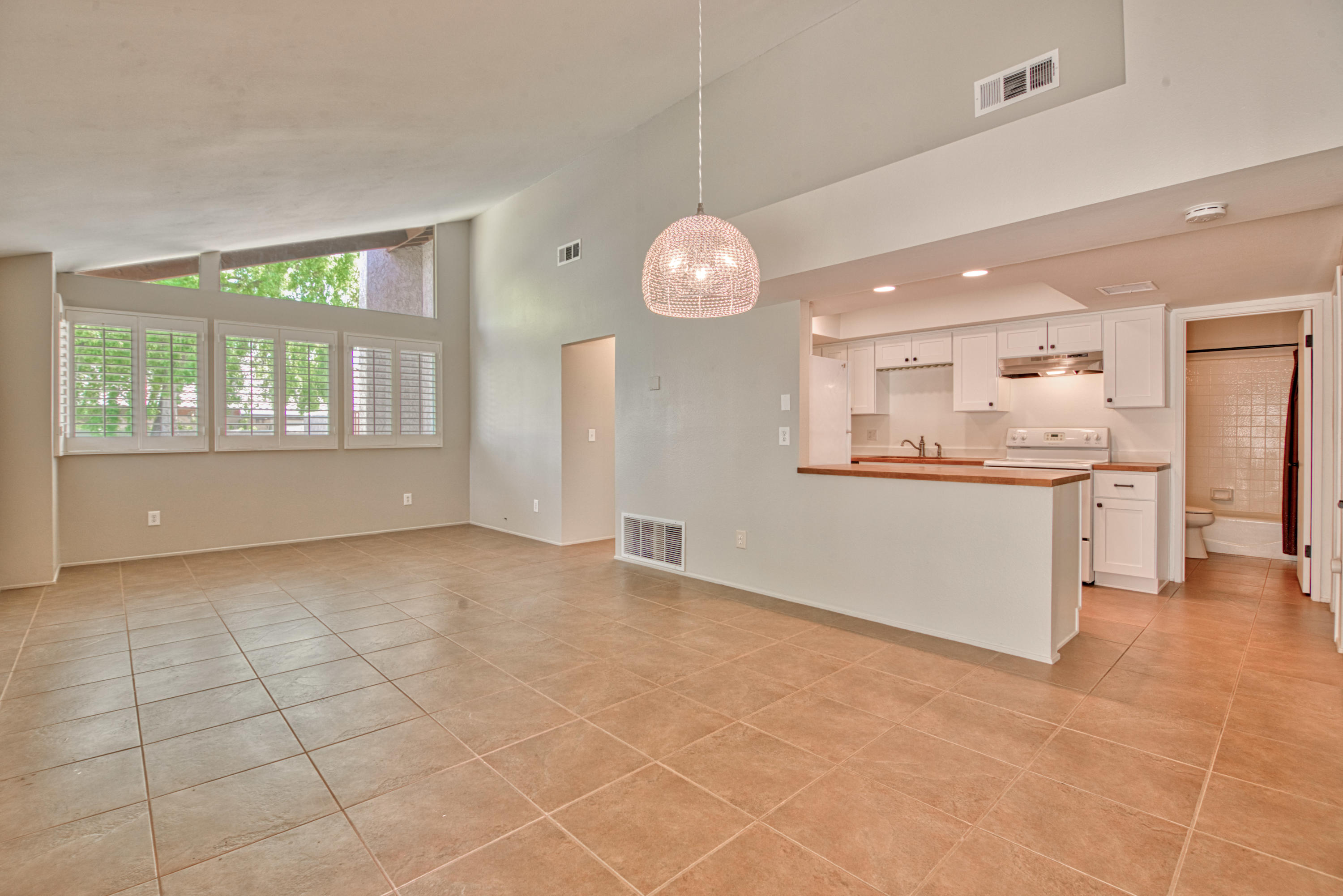 3518 Ridgeview Circle South Palm Springs, CA 92264 - Photo 15 of 32 a view of an empty room with a kitchen