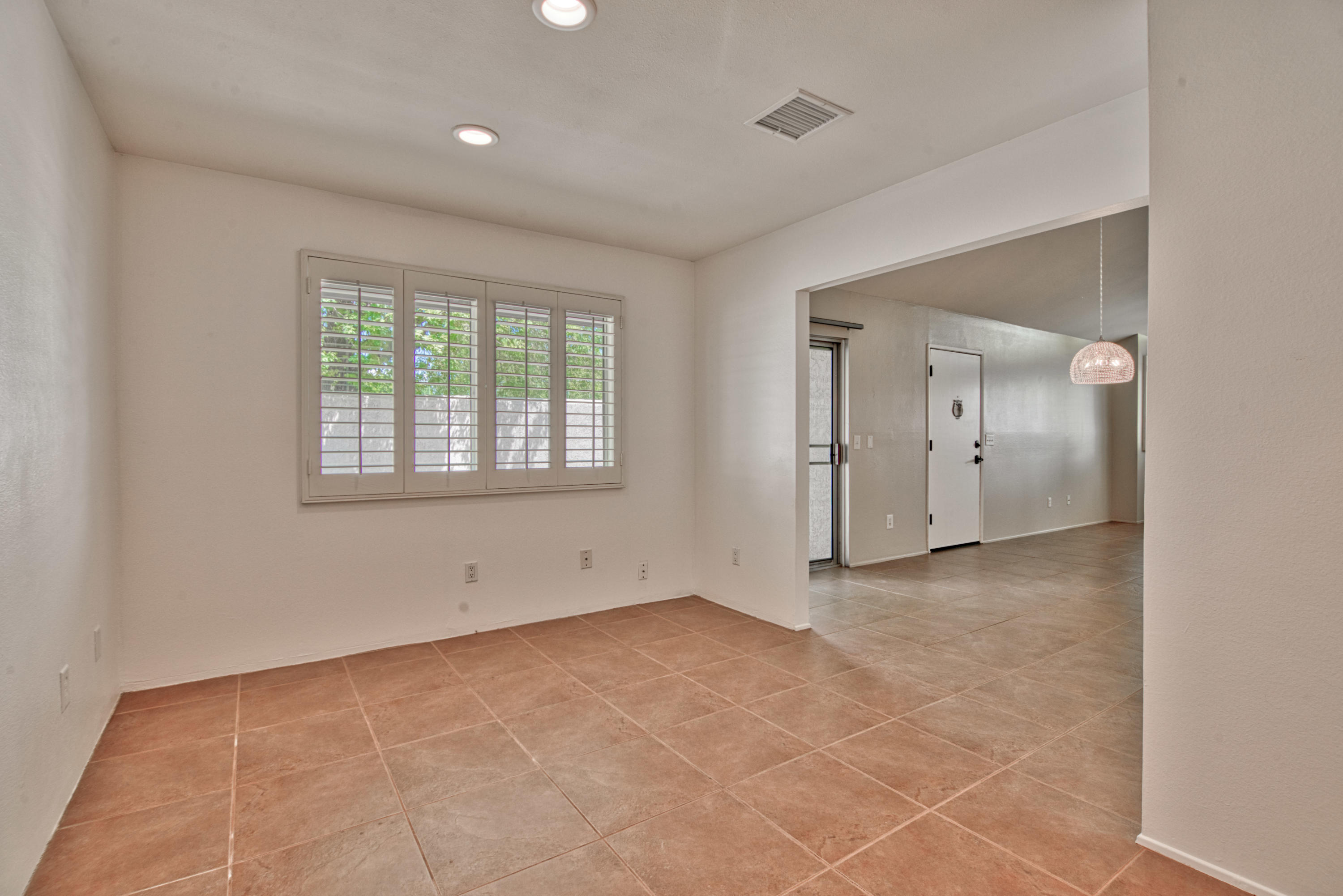 3518 Ridgeview Circle South Palm Springs, CA 92264 - Photo 20 of 32 a view of an empty room with a window