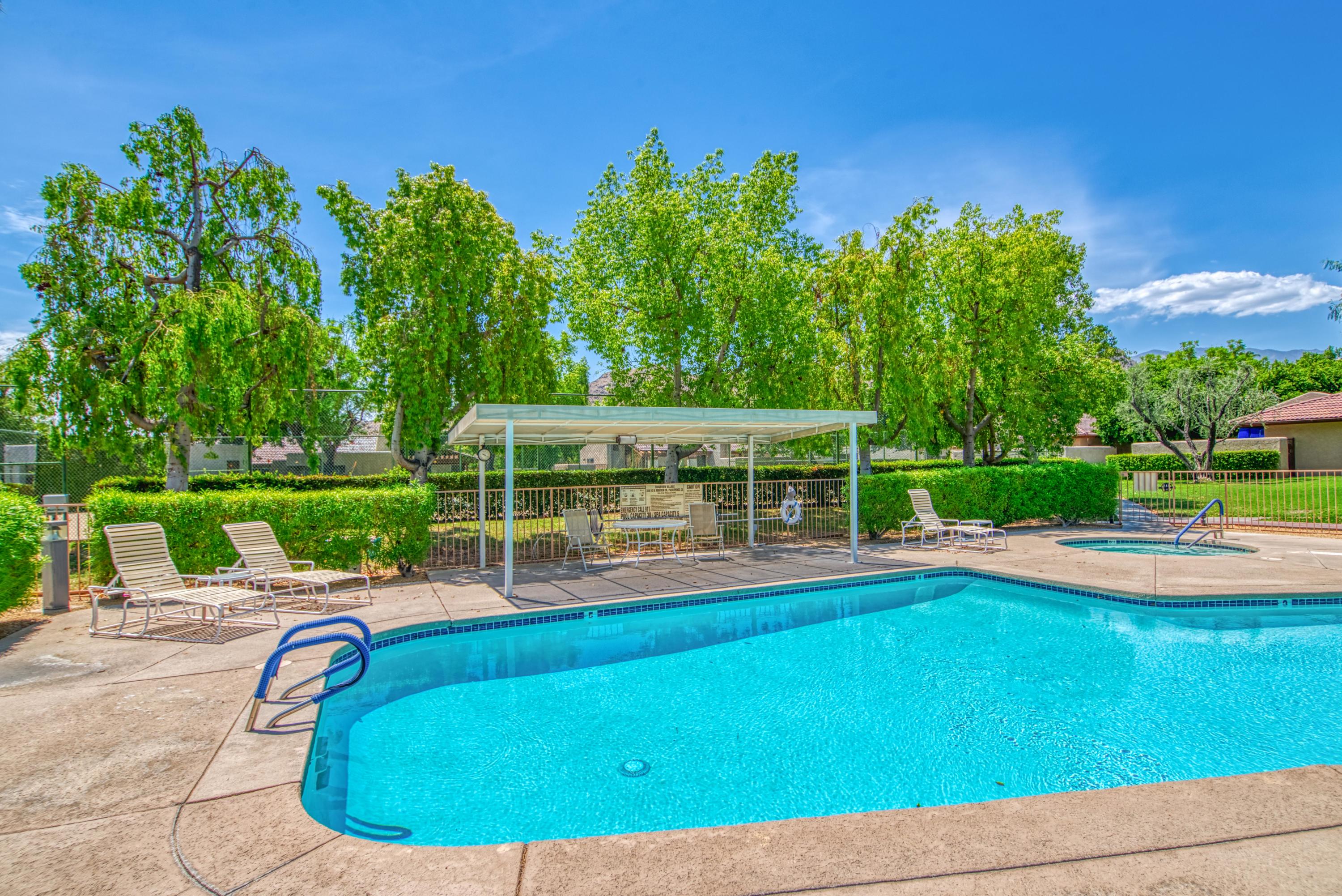 3518 Ridgeview Circle South Palm Springs, CA 92264 - Photo 3 of 32 a view of a swimming pool with a patio