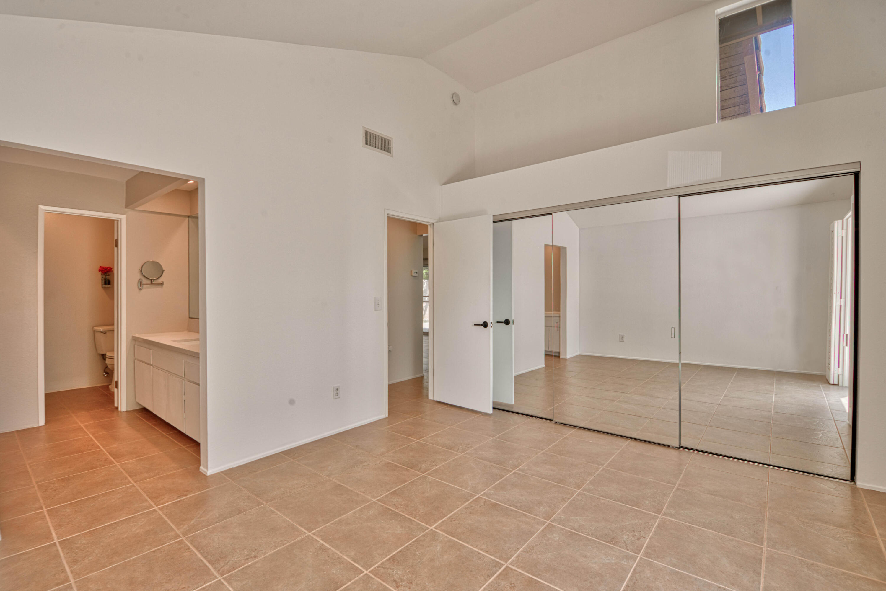 3518 Ridgeview Circle South Palm Springs, CA 92264 - Photo 29 of 32 a view of a room with a walk in closet and living room