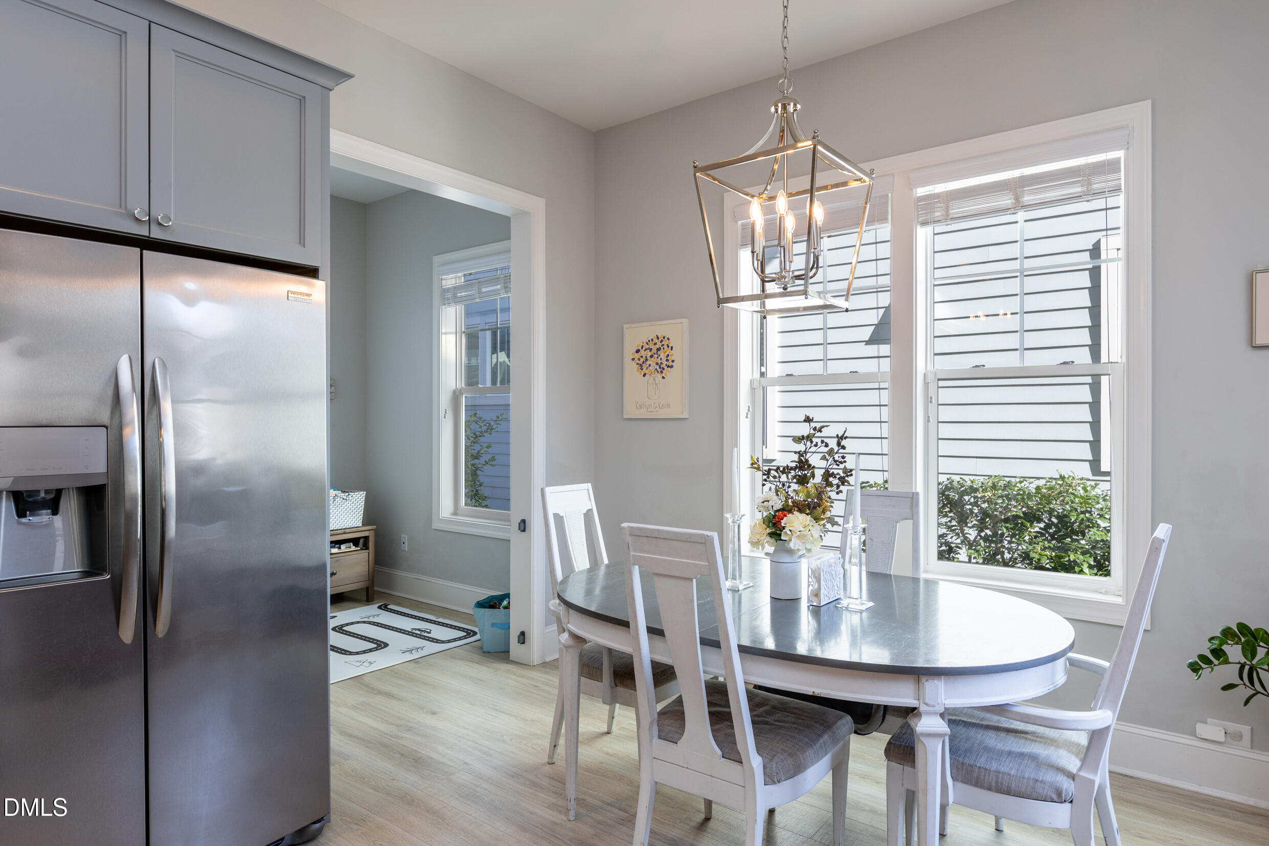 1103 Tannin Drive Durham, NC 27713 - Photo 11 of 28 a view of a dining room with furniture window and outside view