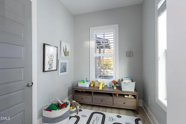 a room with furniture and window