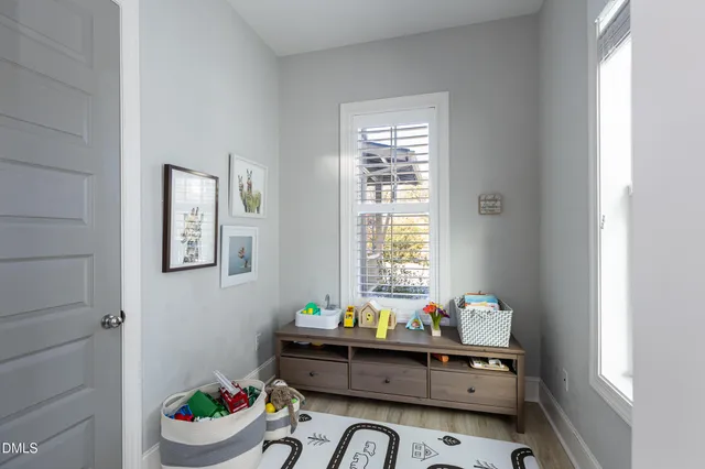 a room with furniture and window