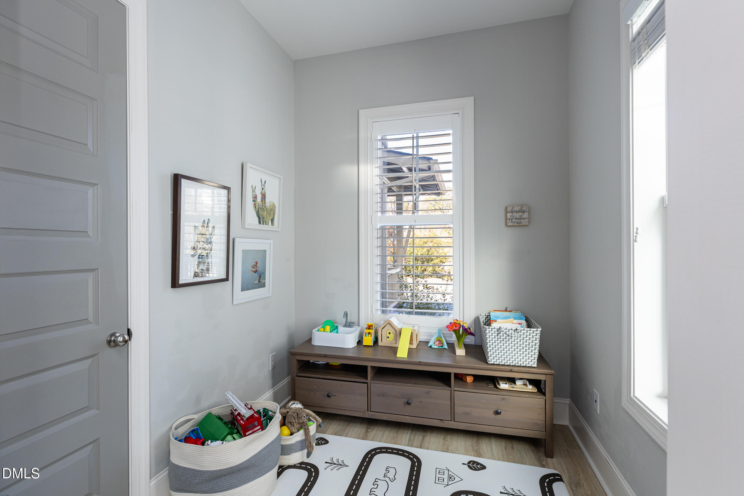 1103 Tannin Drive Durham, NC 27713 - Photo 15 of 28 a room with furniture and window