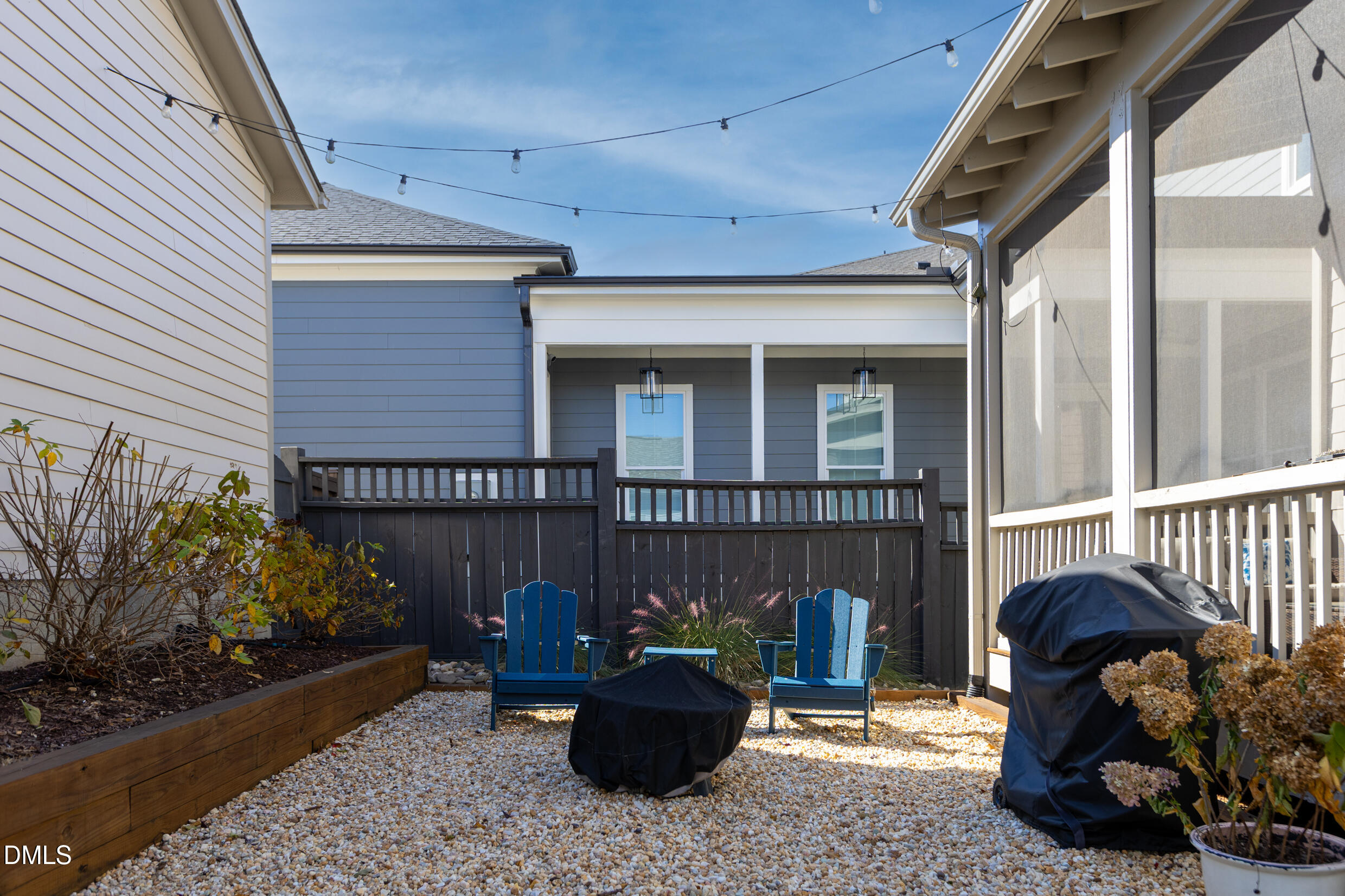 1103 Tannin Drive Durham, NC 27713 - Photo 26 of 28 a living room with furniture and a potted plant