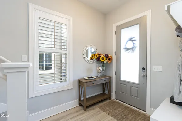 a room with window and cabinet