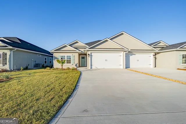 a house with trees in the background