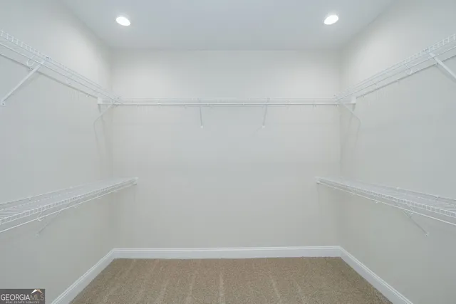 a view of a room with racks on the wall