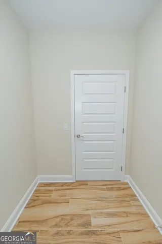 a view of a small space with empty racks