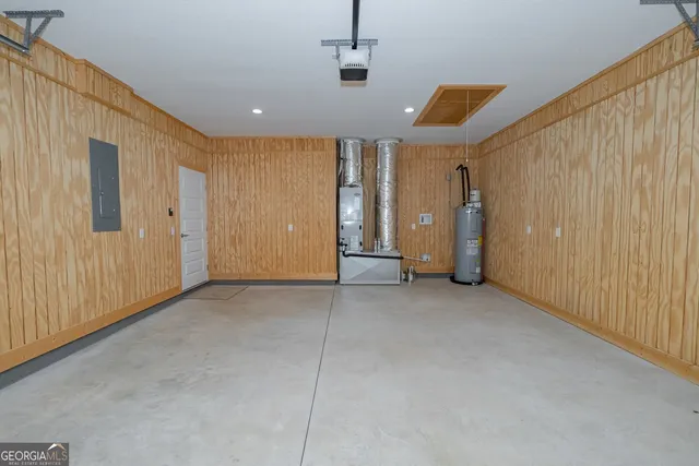 an empty room with closet and windows