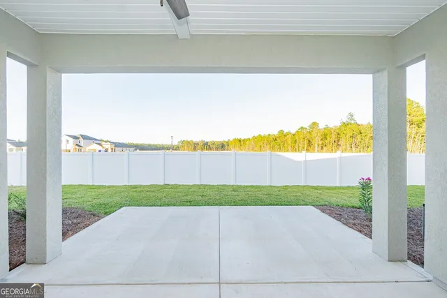 a view of a garden with an outdoor space