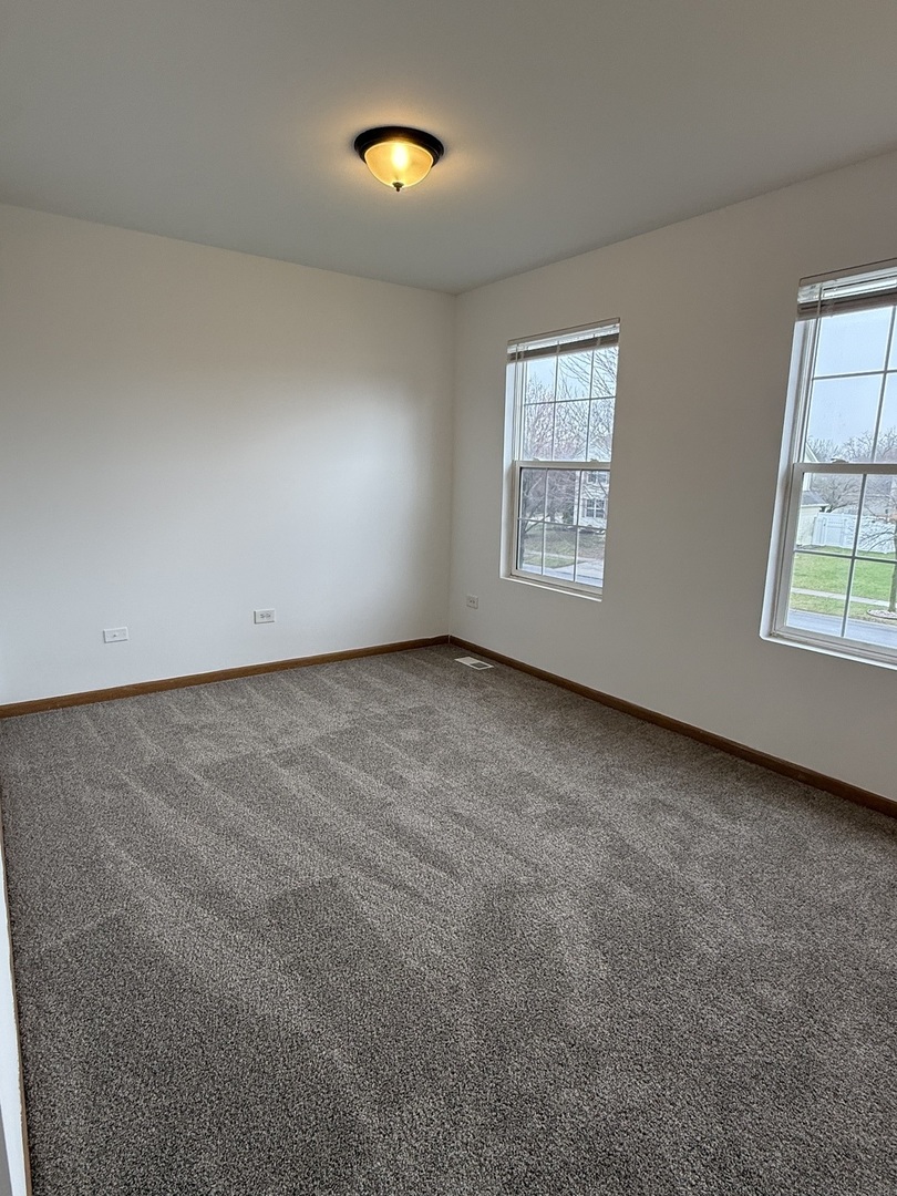1004 Ann Street Joliet, IL 60435 - Photo 19 of 33 an empty room with windows