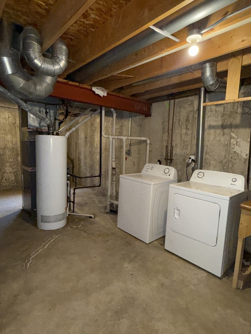1004 Ann Street Joliet, IL 60435 - Photo 28 of 33 a utility room with dryer and washer