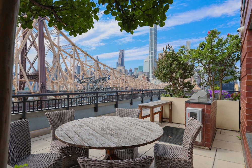 405 Main Street, Unit 9D Manhattan, NY 10044 - Photo 6 of 15 a view of balcony and patio